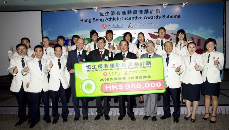 <p>To acknowledge outstanding performances by Hong Kong athletes, a total of HK$950,000 is awarded to 19 Hong Kong olympians under the &quot;Hang Seng Athlete Incentive Awards Scheme&quot; organised by the Hong Kong Sports Institute (HKSI) and sponsored by Hang Seng Bank. Among the 19 recipients, 16 were ranked in the top 16 of their particular event at the Beijing Olympics and three athletes broke five Hong Kong records. Officiating guests Dr Eric Li (4<sup>th</sup> from right, front row), Chairman of the HKSI; Mr Raymond Or (5<sup>th</sup> from right, front row), Vice-Chairman and Chief Executive of Hang Seng Bank; and Mr Pang Chung (6<sup>th</sup> from right, front row), Hon. Secretary General of the Sports Federation &amp; Olympic Committee of Hong Kong, China, pose with Hong Kong Olympians and their coaches.</p>
