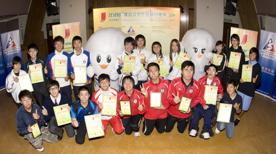 <p>Winners of the ZESPRI&trade;&nbsp;Outstanding Junior Athletes Awards include (from left at back row) Ng Wing-nam and Chiu Chung-hei (table tennis), Cheung King-lok and Choi Ki-ho (cycling), Tong Tsz-wing, Ho Ka-po, Liu Tsz-ling and Lee Ka-man (squash), Fong Yi-tak and Low Ho-tin (fencing), Lo Sin-lam (windsurfing), (2<sup>nd</sup> from left at front row) Ng Ka-long and Lee Chun-hei (badminton), Ho Nim-ching (taekwondo, Hong Kong Sport Association of the Deaf), (from right at front row) Chan Hei-man (windsurfing) and Kwok Chun-hoi (boccia, Hong Kong Paralympic Committee &amp; Sports Association for the Physically Disabled, HKPC&amp;SAPD); as well as recipients of the Certificate of Merit (1<sup>st</sup> from left at front row) Lok Chun-him (finswimming), (3<sup>rd</sup> from right at front row) Tsoi Wai-kin (swimming, HKPC&amp;SAPD), Chu Wai-hin (table tennis, HKSAM) and Yeung Lai-shan (athletics, Hong Kong Sports Association for the Mentally Handicapped, HKSAM).</p>
