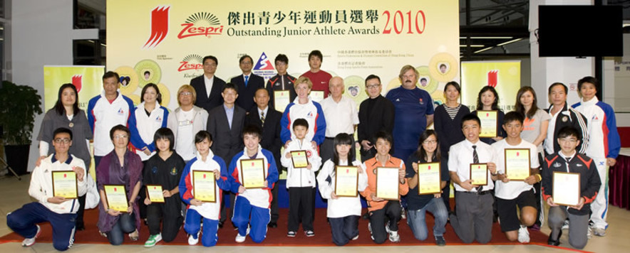 <p>(Middle row) Dr Trisha Leahy (7<sup>th</sup> from left), Chief Executive of the Hong Kong Sports Institute (HKSI); Tony Yue (5<sup>th</sup> from left), Vice President of the Sports Federation &amp; Olympic Committee of Hong Kong, China; Kwok Tze-lung (7<sup>th</sup> from right), Honorary Secretary of the Hong Kong Sports Press Association; together with special guests Eddy Chan (6<sup>th</sup> from left), Head of the Asian Games Bid Team, Robert Wilson (centre), President of Hong Kong, China Rowing Association, athletics coach Yu Lik (2<sup>nd</sup> from left), windsurfing coach Chan Hoi-suen (5<sup>th</sup> from right), karatedo athlete Chan Ka-man (1<sup>st</sup> from right) and squash player Chiu Wing-yin (3<sup>rd</sup> from right), take a group photo with winners of the ZESPRI<sup>&reg;</sup> Outstanding Junior Athlete Awards for the 3<sup>rd</sup> quarter of 2010 and athletes receiving Certificates of Merit.</p>
