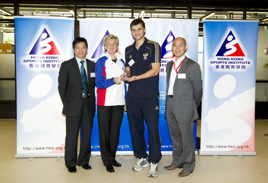 <p>Dr Trisha Leahy (2<sup>nd</sup> from left), Chief Executive of the Hong Kong Sports Institute, accompanied by Benjamin Mok (1<sup>st</sup> from right), Principal Assistant Secretary for Home Affairs (Recreation and Sport) and Vincent Yuen (1<sup>st</sup> from left), General Secretary of Hong Kong Football Association, presents souvenir to Dmitry Strutynskiy (2<sup>nd</sup> from right), representative from The Football Union of Russia.</p>
