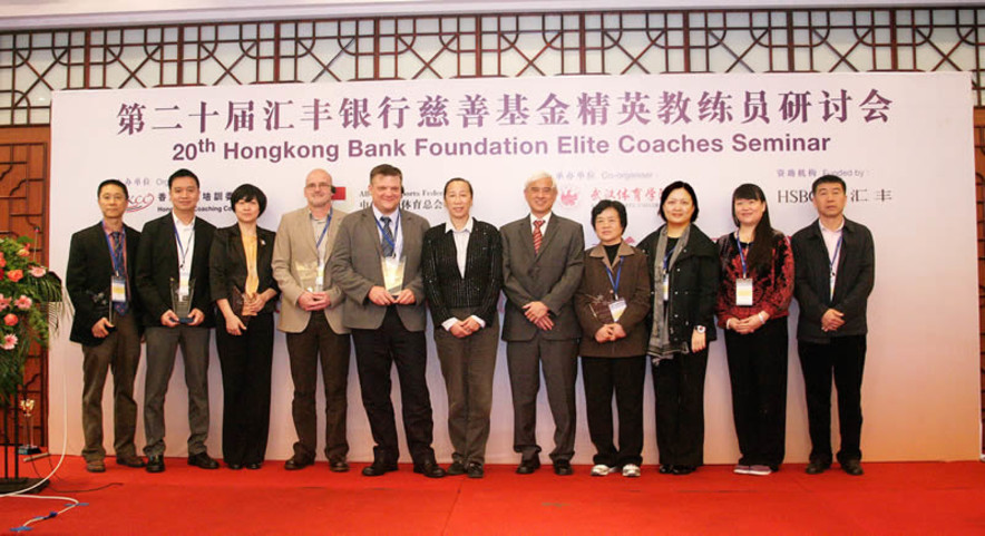 <p>Professor Frank Fu MH JP (5<sup>th</sup>&nbsp;from right), Chairman of the Hong Kong Coaching Committee; Ms Yin Feifei (centre) Deputy Director General of All-China Sports Federation Science and Education Department; Ms Margaret Siu (3<sup>rd</sup>&nbsp;from right), Head of Coaching Support Services of the Hong Kong Sports Institute; Ms Xuping (3<sup>rd</sup>&nbsp;from left), Deputy President of Wuhan Sports University; and Mr Wang Haiming (1<sup>st</sup>&nbsp;from right), President of Adult Education School, Wuhan Sports University poses with the speakers of the 20<sup>th</sup>&nbsp;Hongkong Bank Foundation Elite Coaches Seminar including Professor Feng Meiyun (4<sup>th</sup>&nbsp;from right), Former Deputy Director, Beijing Municipal Bureau of Sports and Former Head, Beijing Institute of Sports Science; Dr Patrick Yung (2<sup>nd</sup>&nbsp;from left), Honorary Secretary, Asia-Pacific Orthopaedic Society of Sports Medicine and Past President, Hong Kong Orthopaedic Association - Sports Medicine Chapter; Dr Si Gangyan (1<sup>st</sup> from left), Sports Psychologist of the Hong Kong Sports Institute; Dr Matt Lydum (5<sup>th</sup>&nbsp;from left), USA Track &amp; Field National Youth Teams Coach and Youth Talent Identification Specialist; and Mr Nick Slinn (4<sup>th</sup>&nbsp;from left), Senior Consultant, Child Protection in Sport Unit, National Society for the Prevention of Cruelty to Children of England.</p>

