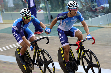 Leung Chun-wing (left) and Ko Siu-wai (cycling)