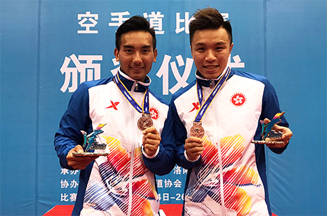 Cheng Tsz-man (left) and Hung Ho-wai (karatedo)