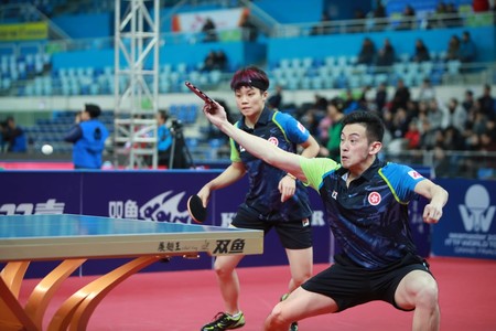 Wong Chun-ting (front) and Doo Hoi-kem (table tennis)