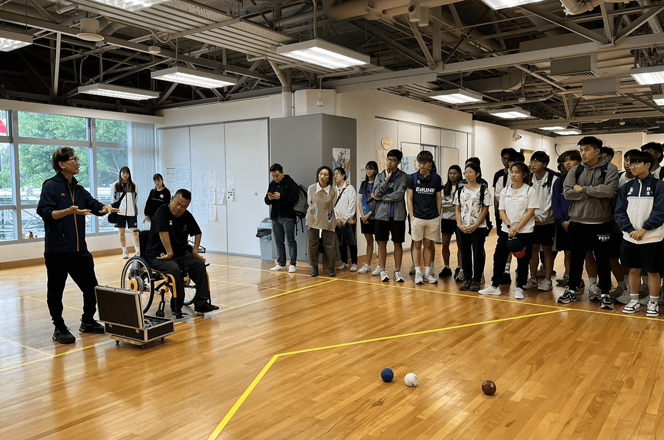 Mr Kwok Hart-wing (first from left), Head Boccia Coach, introduces the sport with six-time Paralympian Leung Yuk-wing (second from left) at the 2023-24 Jockey Club Coach Education - Community Education Programme.