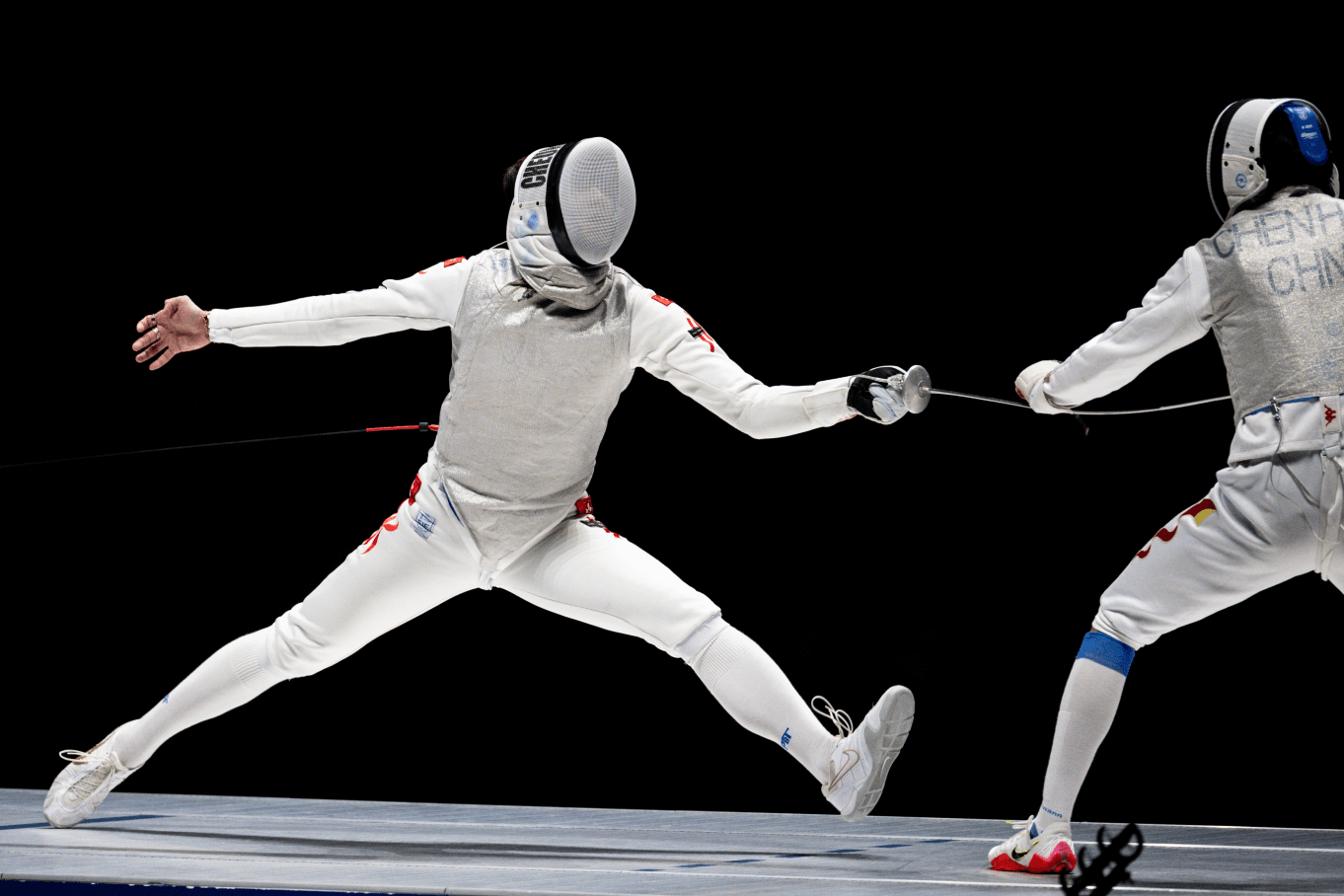 Cheung Ka-long (left, fencing) 