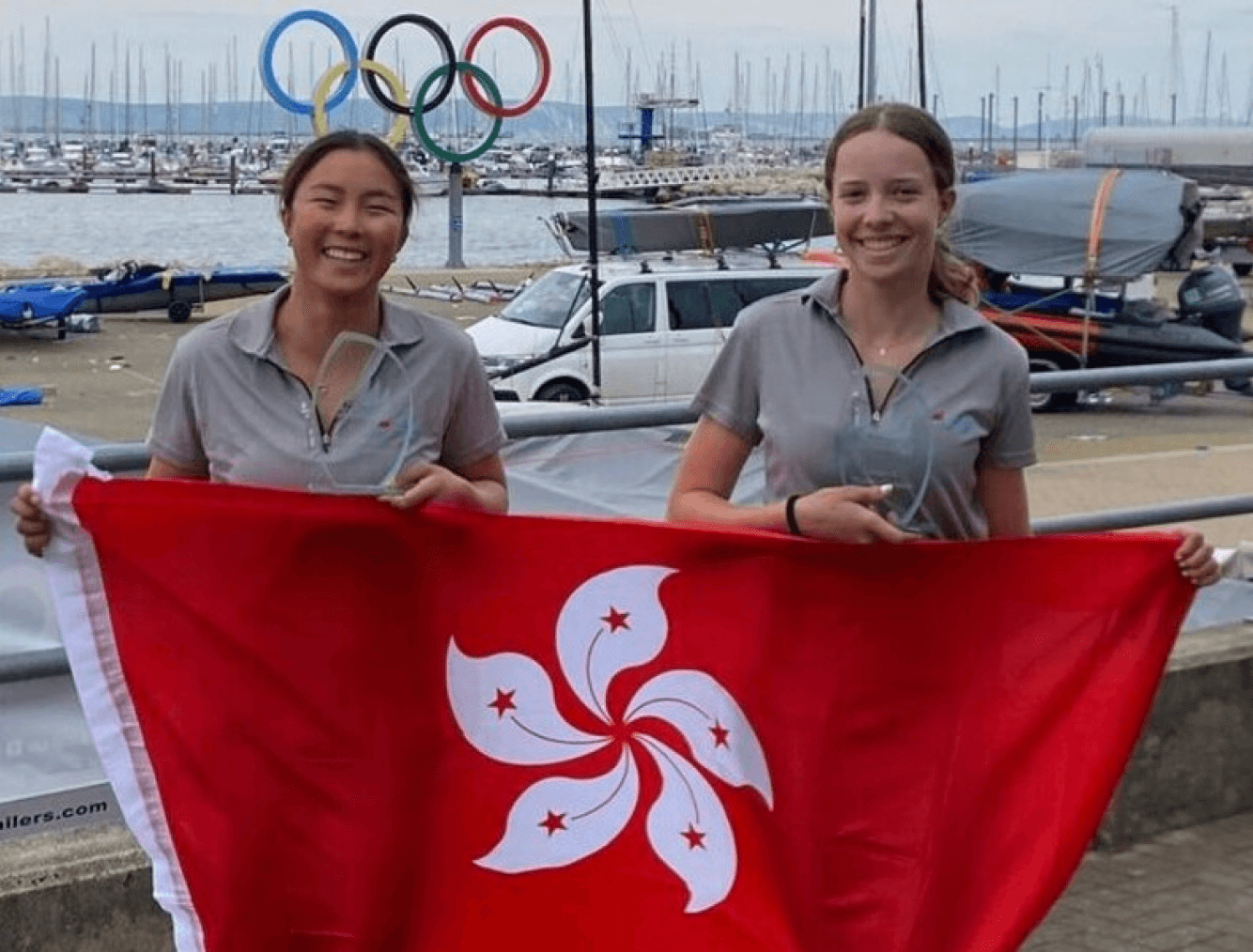 Mak Hiu-tung (left) and Emily Polson (sailing) 