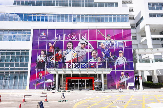 A striking three-storey window wrap celebrates the achievements of 11 local Paris Olympic and Paralympic medallists.