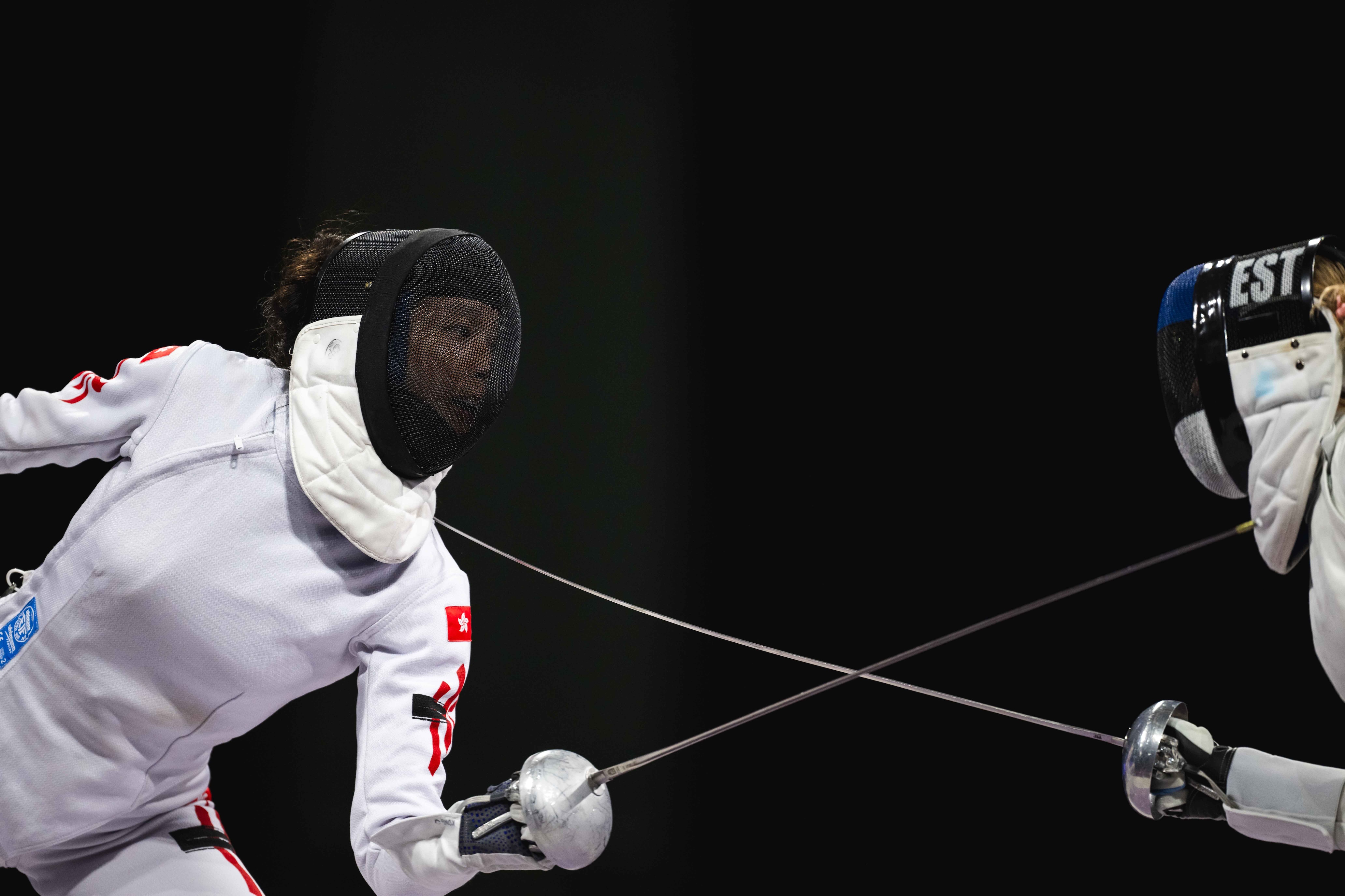 Kong Man-wai (left, fencing)