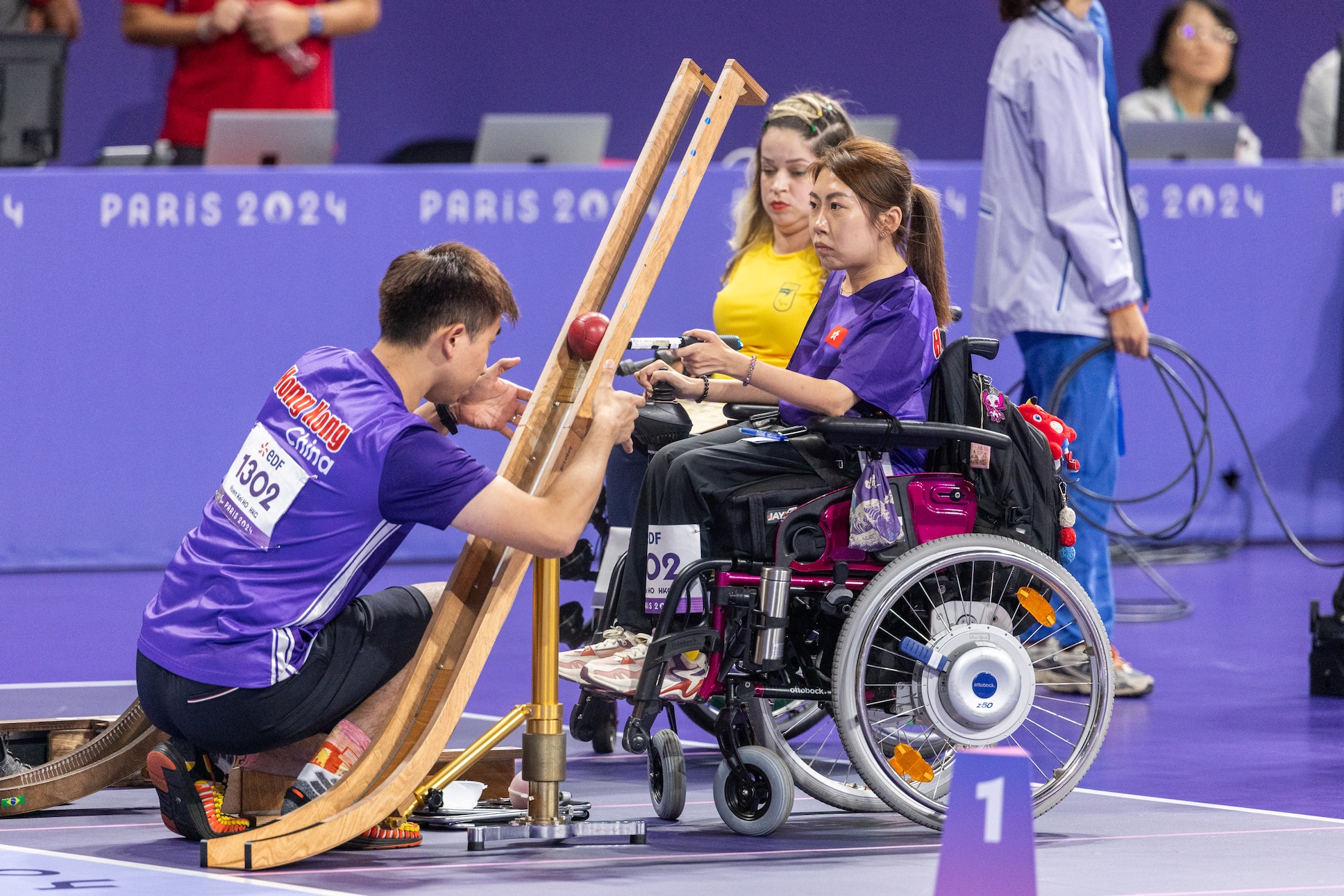 Ho Yuen-kei (right, boccia)