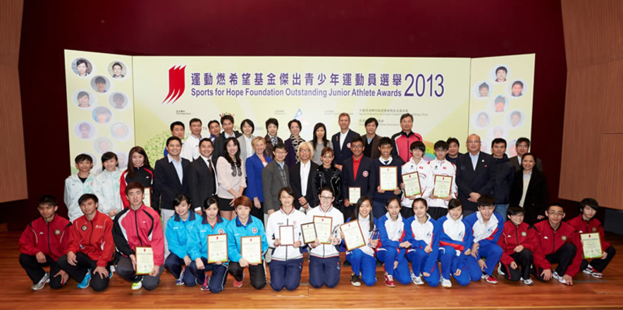 <p>After the presentation ceremony, the officiating guests congratulate all the awarded junior athletes and take a photo in front of the stage with all the 4<sup>th</sup> quarter OJAA recipients of 2013, representatives from National Sports Associations and other guests. Officiating guests include (starting 7<sup>th</sup> from left, 2<sup>nd</sup> row) Dr Trisha Leahy, Chief Executive of the Hong Kong Sports Institute; Mr Tony Yue MH JP, Vice-President of the Sports Federation &amp; Olympic Committee of Hong Kong, China; Mr Raymond Chiu, Vice Chairman of the Hong Kong Sports Press Association and Miss Marie-Christine Lee, Founder of the Sports For Hope Foundation.</p>
