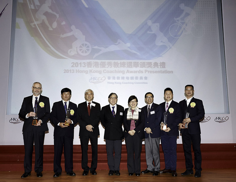 <p>Group photo of presenters and recipients of the Coach of the Year Awards of the 2013 Hong Kong Coaching Awards (from left): swimming coach Michael Peter Fasching (junior athletes, individual sport category); cycling coach Shen Jinkang (senior athletes, individual sport category); Professor Frank Fu MH JP, Chairman of the Hong Kong Coaching Committee; Mr Timothy Fok GBS JP, President of the Sports Federation &amp; Olympic Committee of Hong Kong, China; Ms Florence Hui SBS JP, Acting Secretary for Home Affairs; Mr Carlson Tong JP, Chairman of the Hong Kong Sports Institute; squash coach Dick Leung Kan-fai (junior athletes, team event category); and wheelchair fencing coach Chen Yu (senior athletes, team event category).</p>
