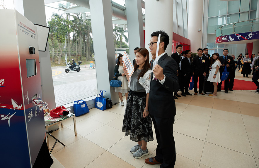 Guests took photos at the photo booth, capturing memorable moments at the event.