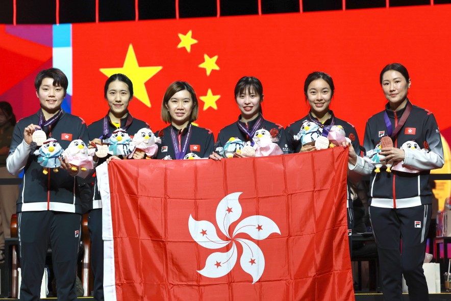 Hong Kong women&#39;s table tennis team and coach (Photo: Hong Kong,